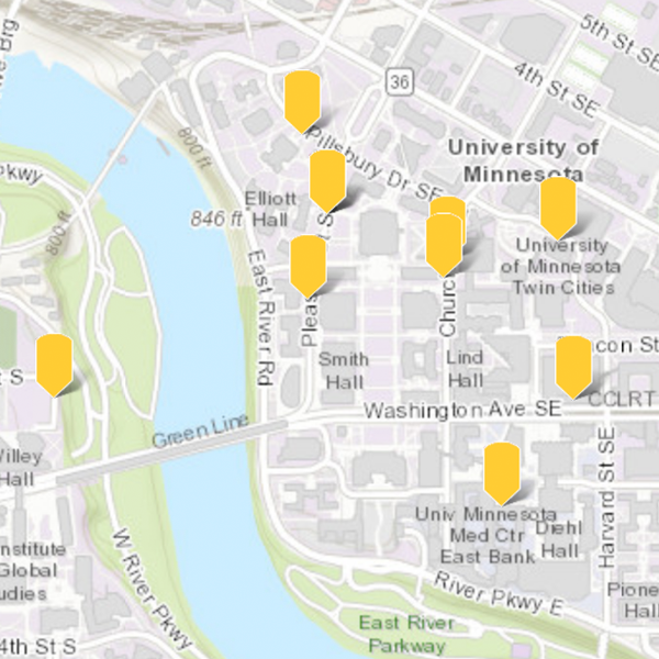 Map of the University of Minnesota East Bank, West Bank, and the Mississippi River running between the two campuses, with gold pins marking important buildings on the campuses
